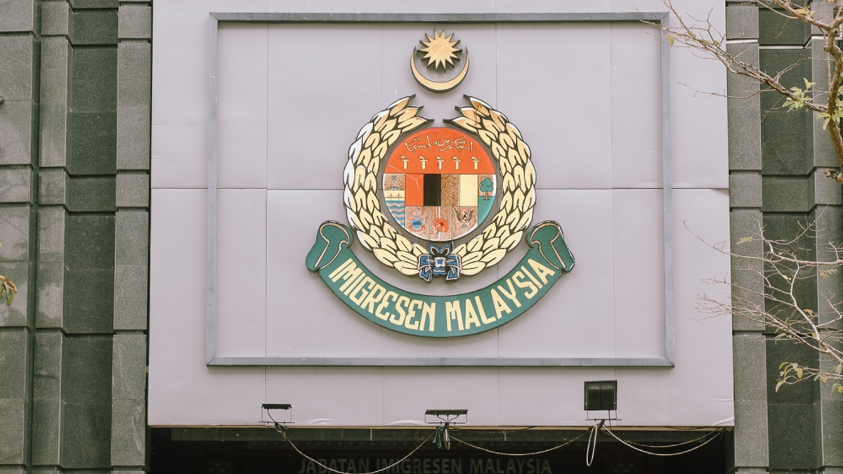 Immigration raids dismantle passport forgery ring in Kuala Lumpur, three arrested with 119 fake documents seized