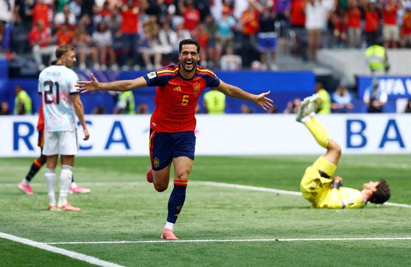 Merino's 88th-minute winner sends Spain past Belgium into World Cup semis