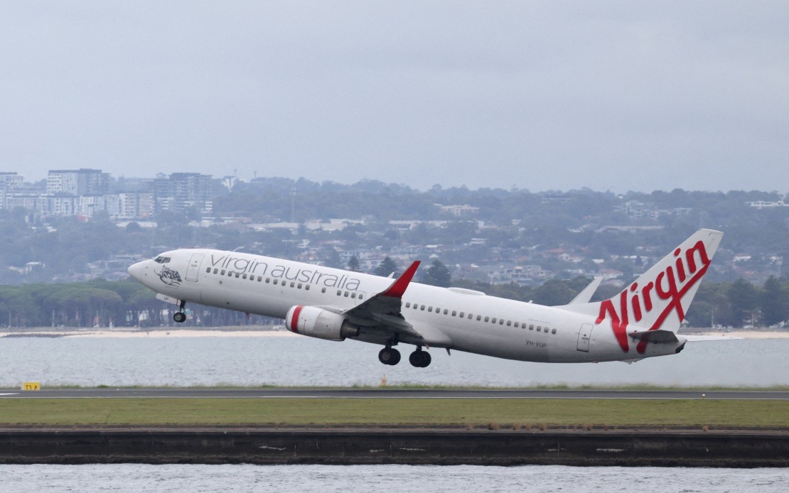 Jetstar and Qatar Airways Jets Nearly Collide at Sydney Airport, Crew Member Injured