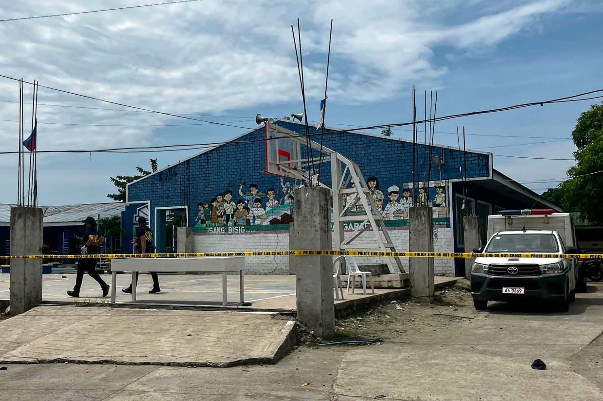 Two teenage gunmen kill three students in Philippines high school shooting