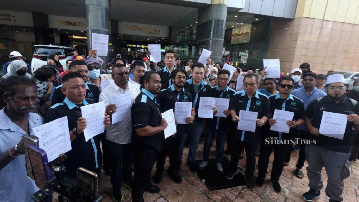 Victims' group pressures police to accelerate cases against 18 suspected fraudulent investment firms