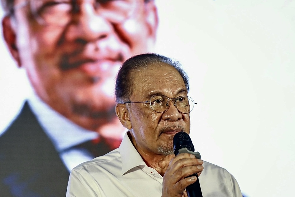 Anwar awaits briefing on Melaka DAP crisis as PH vows swift action
