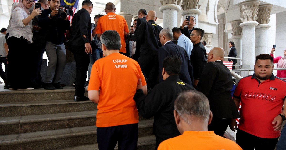 Former Tabung Haji chief and Treasury official appear in court over alleged misconduct