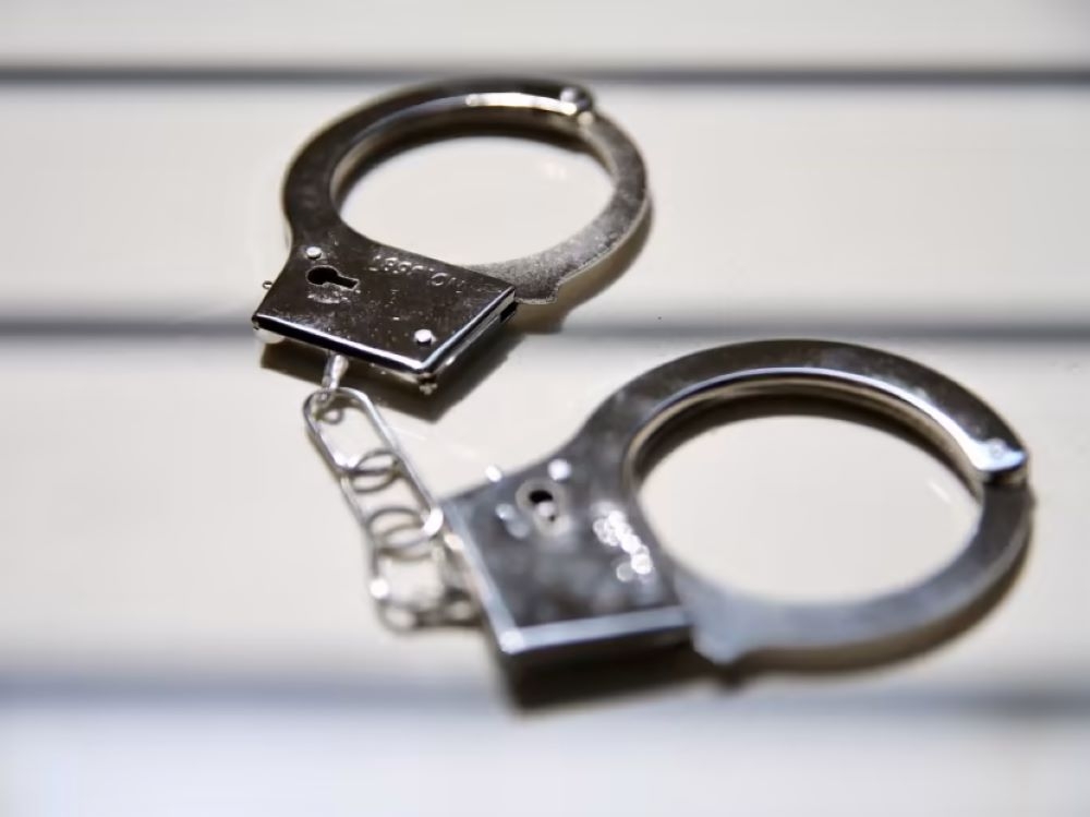 Activist Held in Seremban on Return from Thailand as Police Pursue Investigation