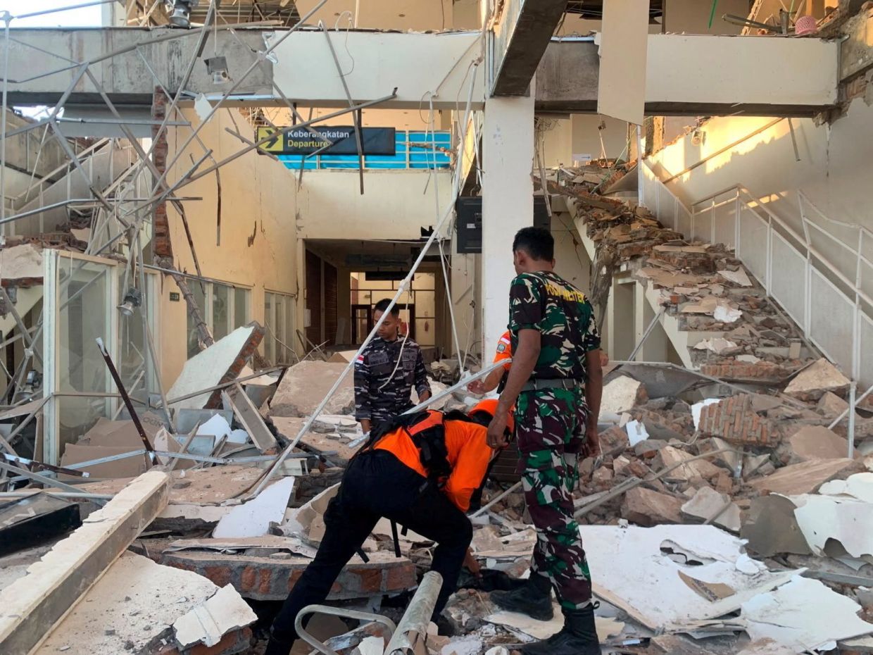 Magnitude 7.7 earthquake strikes off Indonesia's Flores coast, killing at least two and collapsing buildings