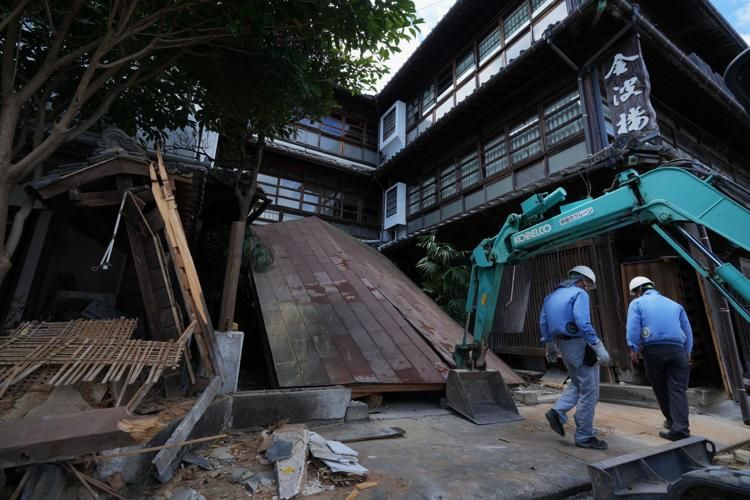Heat stroke death underscores dual crisis facing Japan's quake-stricken Kumamoto