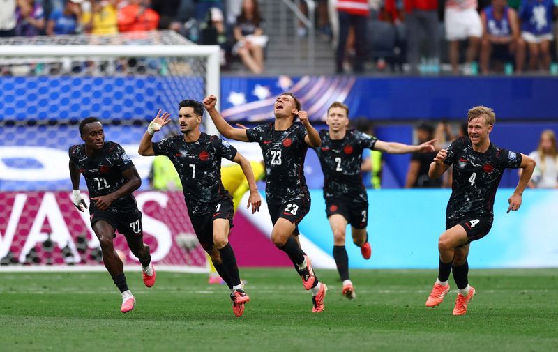 Eustaquio's stoppage-time goal sends Canada into World Cup last 16 for first time