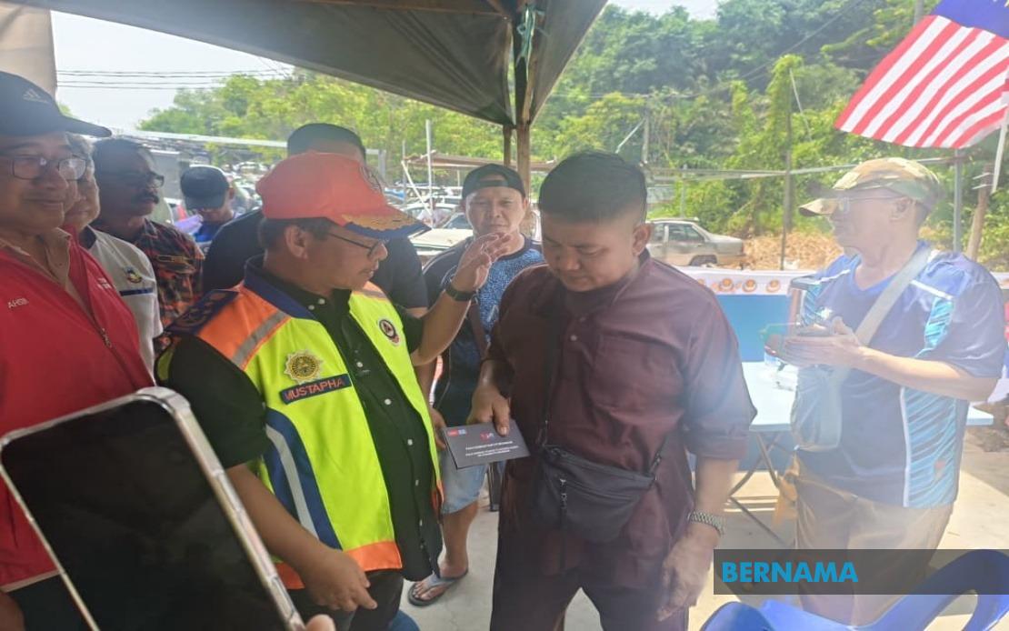 Grandfather's Anguish as Three Children Perish in Kampung Lok Buta Inferno